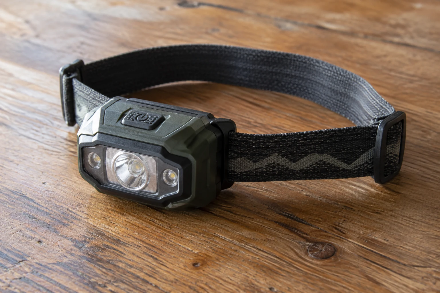 Kompakte Stirnlampe mit verstellbarem Band.