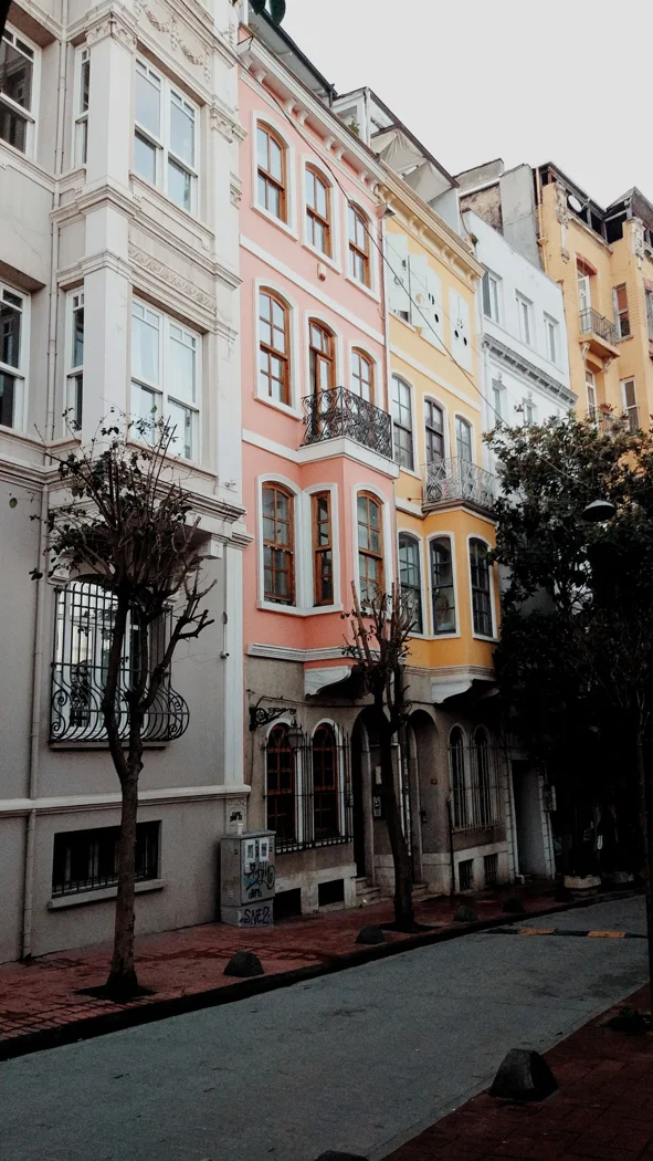 Building facades on a quiet urban street.